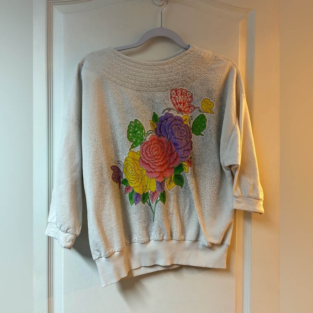 Vintage scoop neck sweater with shoulder pads.